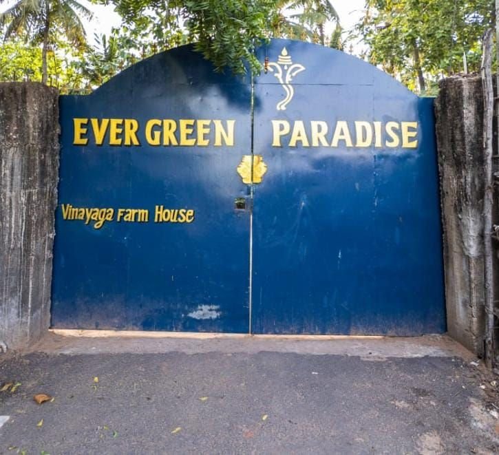 Evergreen Paradise entrance gate with the name sign